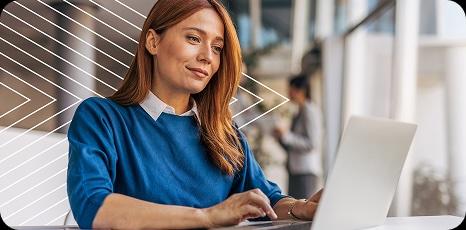 woman typing on laptop